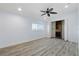 Bright bedroom with wood flooring and a ceiling fan at 298 Fry Se Ter, Port Charlotte, FL 33952