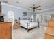 Main bedroom with access to backyard and ceiling fan at 298 Fry Se Ter, Port Charlotte, FL 33952