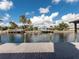 Relaxing waterfront dock with stunning canal and neighborhood views at 298 Fry Se Ter, Port Charlotte, FL 33952