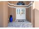 Elegant entryway with double doors and blue pot at 298 Fry Se Ter, Port Charlotte, FL 33952