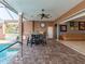 Outdoor patio with pool, seating area, and access to the interior at 298 Fry Se Ter, Port Charlotte, FL 33952