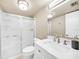 Updated bathroom with a shower/tub combo, white vanity, and modern fixtures at 311 Garvin St # 207B, Punta Gorda, FL 33950