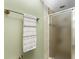 Shower with frosted glass door and neutral colored walls at 3183 Sulstone Dr, Punta Gorda, FL 33983