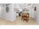 Kitchen dining area with wood table and chairs, adjacent to kitchen at 3183 Sulstone Dr, Punta Gorda, FL 33983