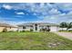 House exterior, single-story with garage at 3183 Sulstone Dr, Punta Gorda, FL 33983