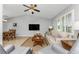 Open living area with vaulted ceiling, neutral decor, and comfortable seating at 3183 Sulstone Dr, Punta Gorda, FL 33983