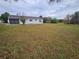 Large backyard with grassy area at 3261 Mill Run Ct, North Port, FL 34287