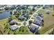 Aerial view of the neighborhood showcasing the variety of home styles and mature landscaping at 336 Japura St, Punta Gorda, FL 33983