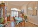 Dining room showcasing a bright window, decorative lighting and a lovely table setting at 336 Japura St, Punta Gorda, FL 33983