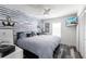 Bedroom with nautical-themed decor and king-size bed at 4000 Bal Harbor Blvd # 225, Punta Gorda, FL 33950