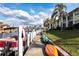 Community boat dock with kayaks and small boats at 4000 Bal Harbor Blvd # 225, Punta Gorda, FL 33950