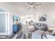 Open living room with hardwood floors and view of kitchen and dining area at 4000 Bal Harbor Blvd # 225, Punta Gorda, FL 33950