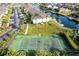 Community tennis court with surrounding landscape at 4000 Bal Harbor Blvd # 225, Punta Gorda, FL 33950