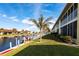 Waterfront view of canal, boat dock and lush landscaping at 4000 Bal Harbor Blvd # 225, Punta Gorda, FL 33950