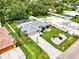 Aerial view of single-story home with pool and large backyard at 4059 Twinbush Ter, North Port, FL 34286