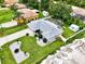 Aerial view of single-story home with pool and large backyard at 4059 Twinbush Ter, North Port, FL 34286