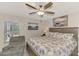 Main bedroom with king bed and ceiling fan at 4059 Twinbush Ter, North Port, FL 34286