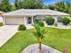 Single-story home with attached garage and landscaping at 4059 Twinbush Ter, North Port, FL 34286