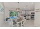 Kitchen with stainless steel appliances and white cabinets at 4059 Twinbush Ter, North Port, FL 34286