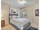 Guest bedroom with a comfortable bed and calming decor at 4149 Cascade Falls Dr, Sarasota, FL 34243