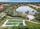 Community bocce ball courts near a pond at 4149 Cascade Falls Dr, Sarasota, FL 34243