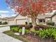 Villa with two-car garage and autumn foliage at 4149 Cascade Falls Dr, Sarasota, FL 34243