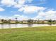 Tranquil lake view of community homes at 4149 Cascade Falls Dr, Sarasota, FL 34243