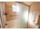 Shower and tub combination with sliding glass door and grab bar for assistance at 4355 Boggs St, Port Charlotte, FL 33948