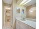 Bathroom with double vanity and shower at 4415 Mundella Cir, Port Charlotte, FL 33948