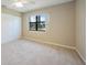 Bright bedroom with carpeted floor and double closets at 4415 Mundella Cir, Port Charlotte, FL 33948