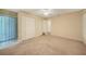 Bedroom with double door closet and view to bathroom at 4415 Mundella Cir, Port Charlotte, FL 33948