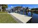 A sturdy dock with a boat lift provides easy access to the water at 4542 Fallon Cir, Port Charlotte, FL 33948