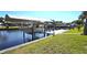 Private boat dock and lift offers convenient waterfront access at 4542 Fallon Cir, Port Charlotte, FL 33948