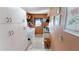 Bright laundry room with washer, dryer, storage, and shelving providing ample space for chores at 4542 Fallon Cir, Port Charlotte, FL 33948