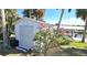 Storage shed in the backyard with beautiful bougainvillea at 4542 Fallon Cir, Port Charlotte, FL 33948