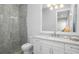 Elegant bathroom with a walk-in shower and modern vanity at 500 Blue Shell Loop, Sarasota, FL 34240