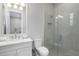 Clean bathroom with a shower and white vanity at 500 Blue Shell Loop, Sarasota, FL 34240