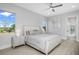 Spacious bedroom with a plush bed and access to the outdoors at 500 Blue Shell Loop, Sarasota, FL 34240