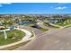 Community entrance with a sign and landscaping at 500 Blue Shell Loop, Sarasota, FL 34240