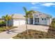 House exterior with a driveway and landscaping at 500 Blue Shell Loop, Sarasota, FL 34240