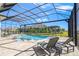 Relax by the refreshing pool and spa, screened for your comfort at 500 Blue Shell Loop, Sarasota, FL 34240