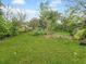 Landscaped backyard with garden at 625 Pompano Ter, Punta Gorda, FL 33950