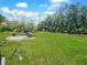 Large backyard with green grass at 625 Pompano Ter, Punta Gorda, FL 33950