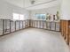 Under renovation, this bedroom features exposed walls and new carpeting at 625 Pompano Ter, Punta Gorda, FL 33950