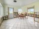 Renovation in progress: Dining area with tiled floor at 625 Pompano Ter, Punta Gorda, FL 33950