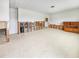 A living room undergoing renovations, with exposed framing and flooring at 625 Pompano Ter, Punta Gorda, FL 33950