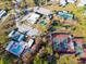 This is an aerial view of the community with tennis courts and shuffleboard at 6835 Anapa Ct, North Port, FL 34287