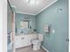 Classic bathroom with vanity, toilet, and shower at 6835 Anapa Ct, North Port, FL 34287