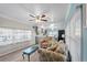 Bright living room with a contemporary coffee table and neutral walls provides a peaceful atmosphere at 6835 Anapa Ct, North Port, FL 34287