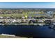 Aerial view of canal front home with golf course views at 716 Monaco Dr, Punta Gorda, FL 33950